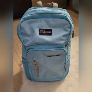 Light blue/baby blue Jansport backpack with padded straps